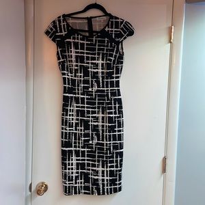 Worn twice. Black and white fitted dress.